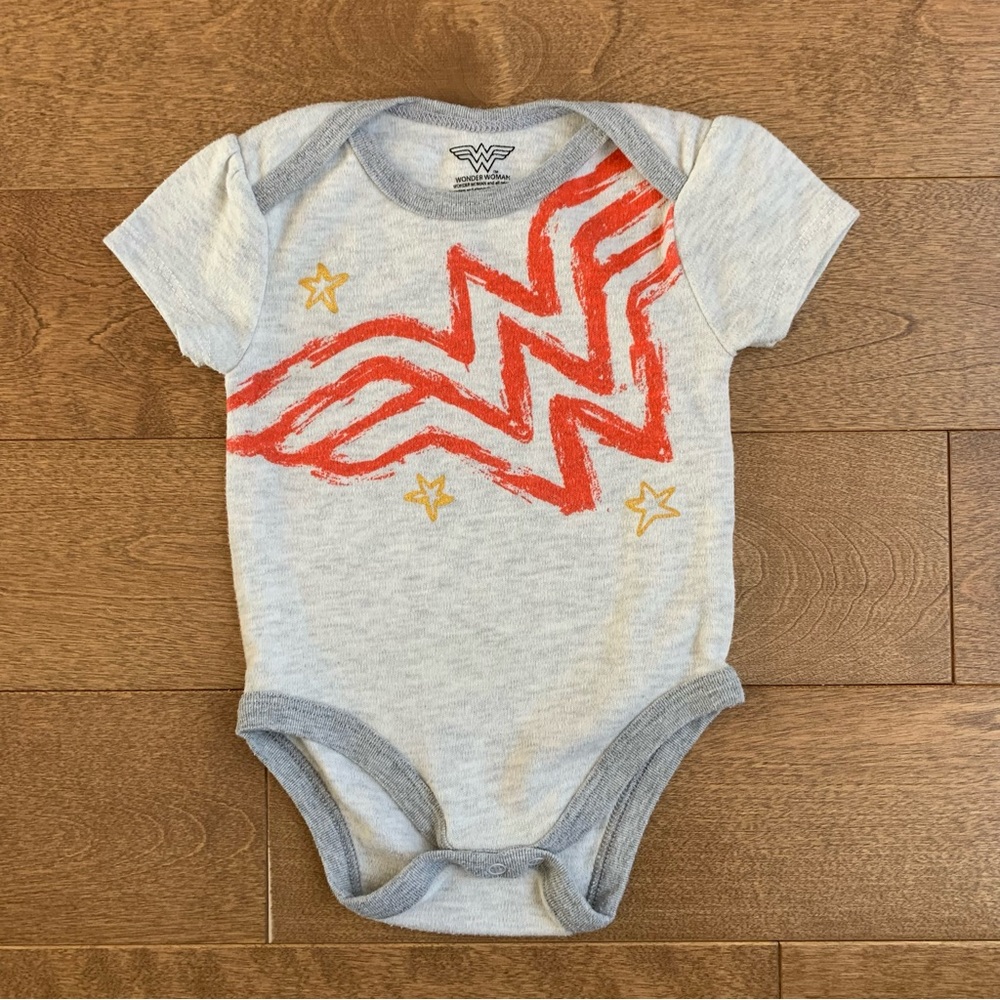 3/$10 WONDER WOMAN Baby girl bodysuit 6-9m